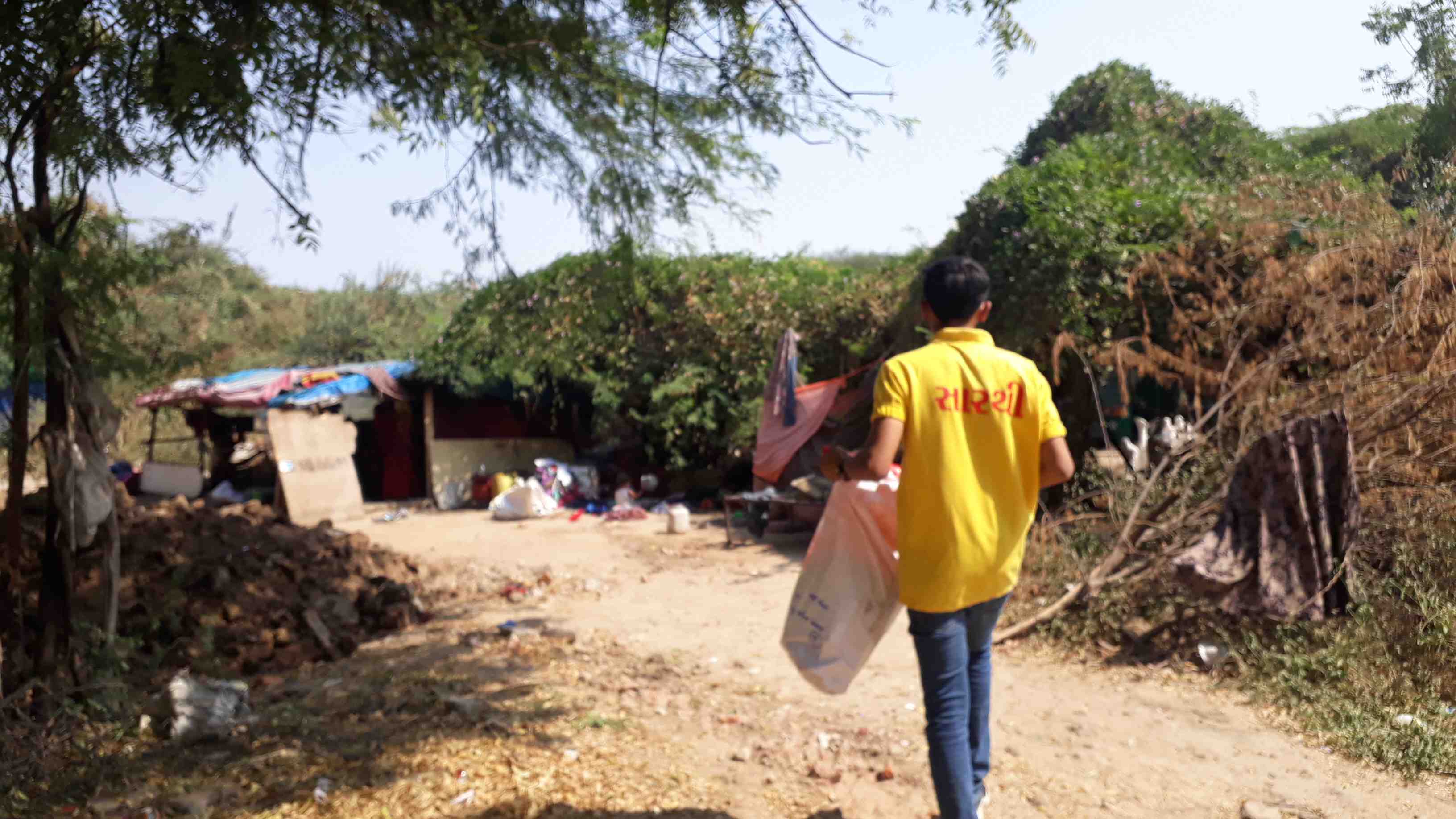 Volunteer carrying festival packages