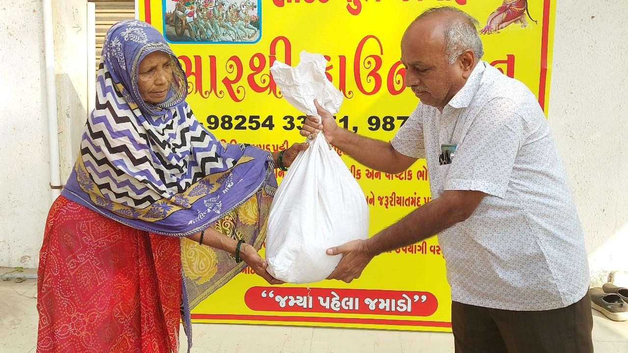 Individual distribution of grocery kit to elderly widow